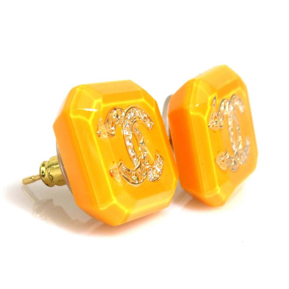 CHANEL Yellow Logo Earrings - Picture 2 of 8